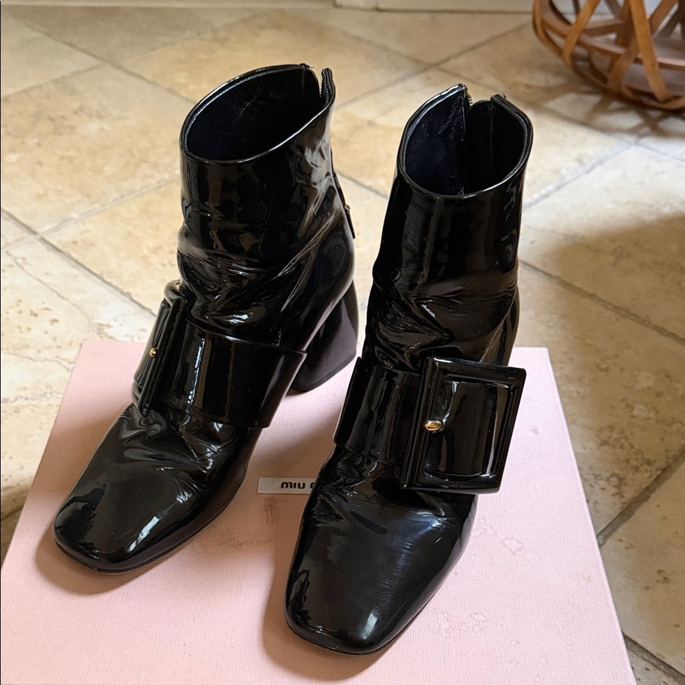 Miu Miu Shiny Black Ankle Booties with Statement Buckle